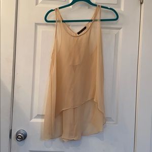 Asymmetrical sheer top